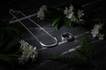 Men's minimalist sterling silver jewelry set with dark leaves and flowers